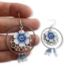 Boucles d'oreilles pendantes, fleur bleue, en pâte polymère