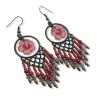 Boucles d'oreilles bohème pendantes avec fleurs d'hibiscus en pâte polymère
