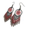 Boucles d'oreilles bohème pendantes avec fleurs d'hibiscus en pâte polymère
