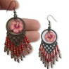 Boucles d'oreilles bohème pendantes avec fleurs d'hibiscus en pâte polymère