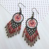 Boucles d'oreilles bohème pendantes avec fleurs d'hibiscus en pâte polymère