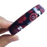 Bracelet fleurs rouges, fond noir, en pâte polymère
