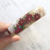 Bracelet poinsettias noel, fond nacre et or, en pâte polymère
