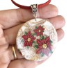 Médaillon / pendentif poinsettias, en pâte polymère