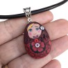 Pendentif matriochka fleurie en pâte polymère