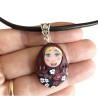 Pendentif matriochka fleurie en pâte polymère