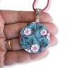 Médaillon rond / pendentif joli bouquet cerisier en relief, en pâte polymère