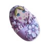 Broche matriochka fleurie en pâte polymère