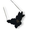 Collier court fleuri en pâte polymère monté sur chaîne
